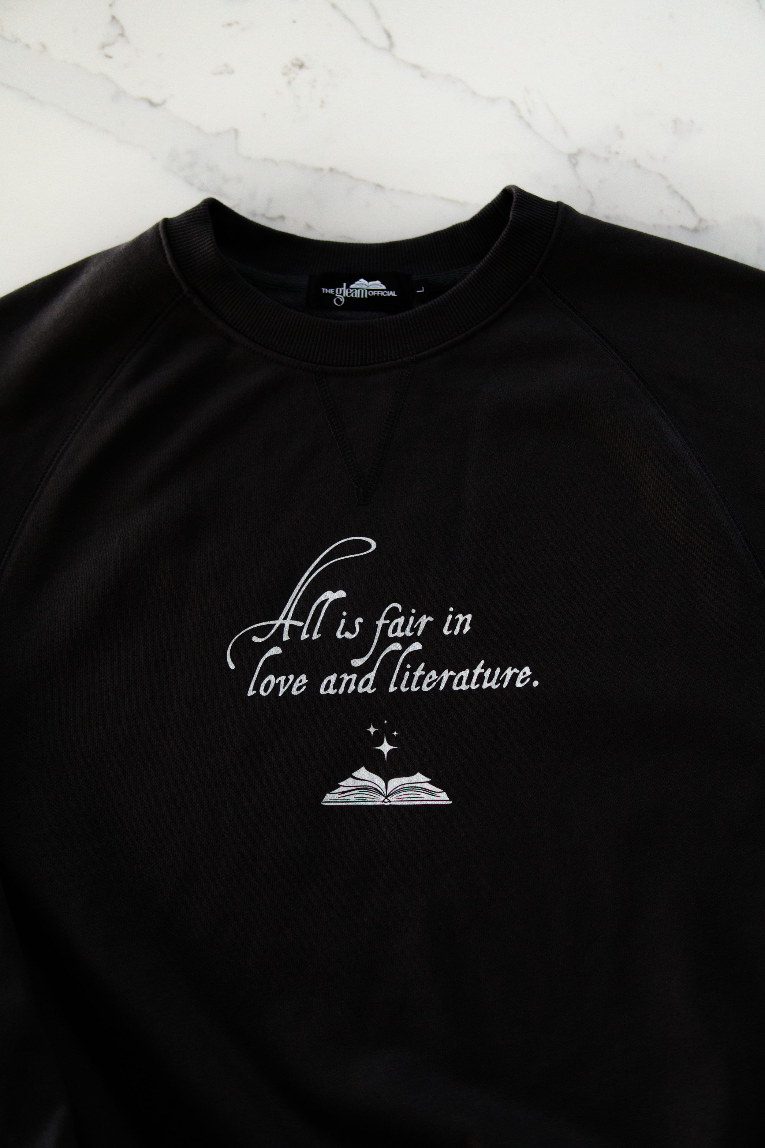 Front view of dark gray heavyweight boxy sweatshirt showing relaxed fit and crew neckline