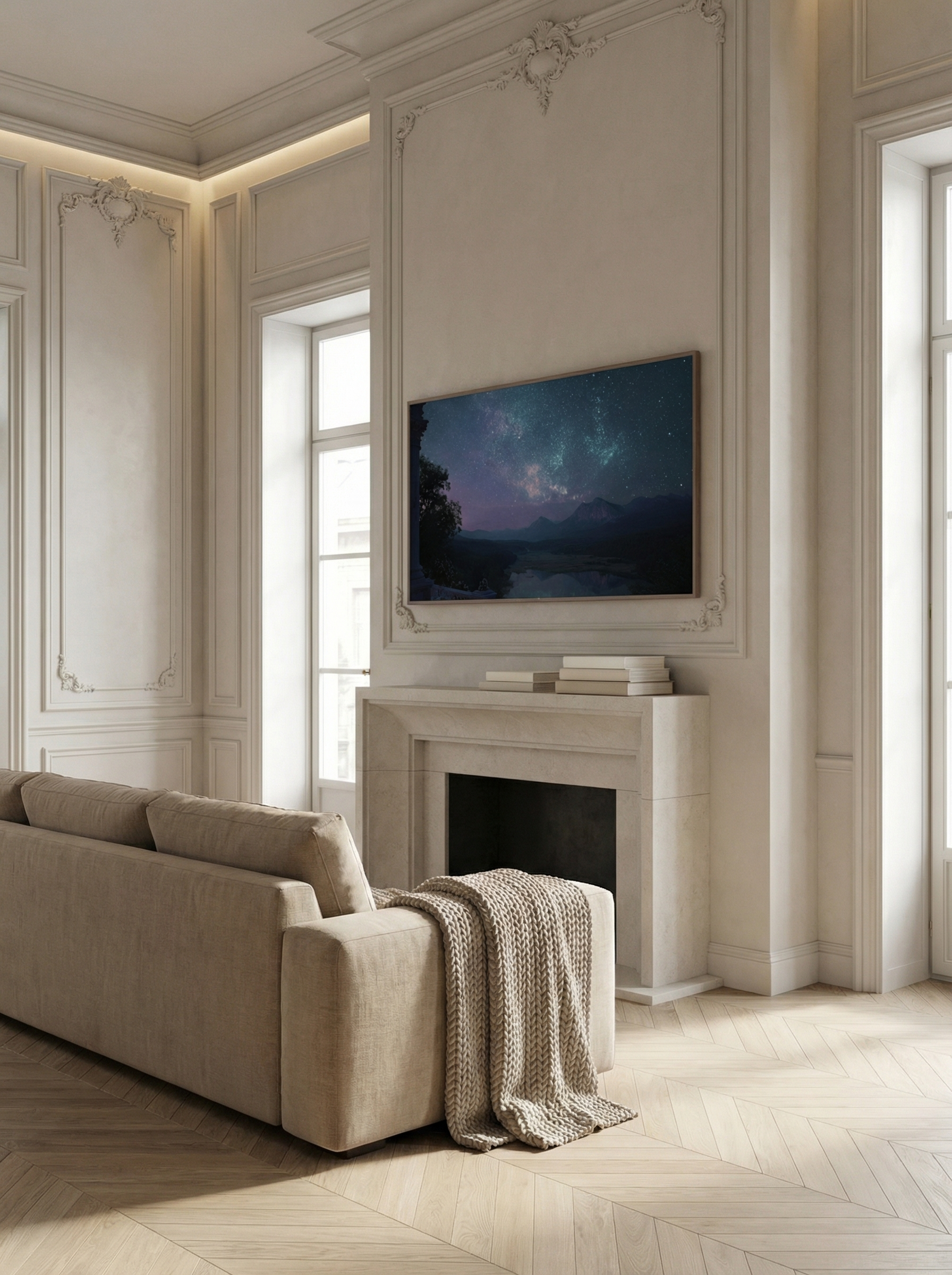 Romantic twilight sky artwork hung above a stone fireplace in a refined neutral-toned living room.